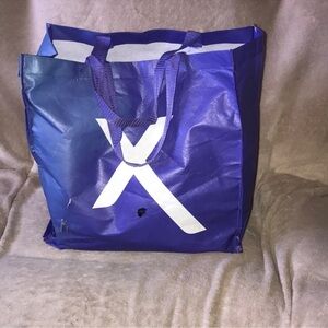 Xfinity purple/Blue and white reusable Tote Bag damaged